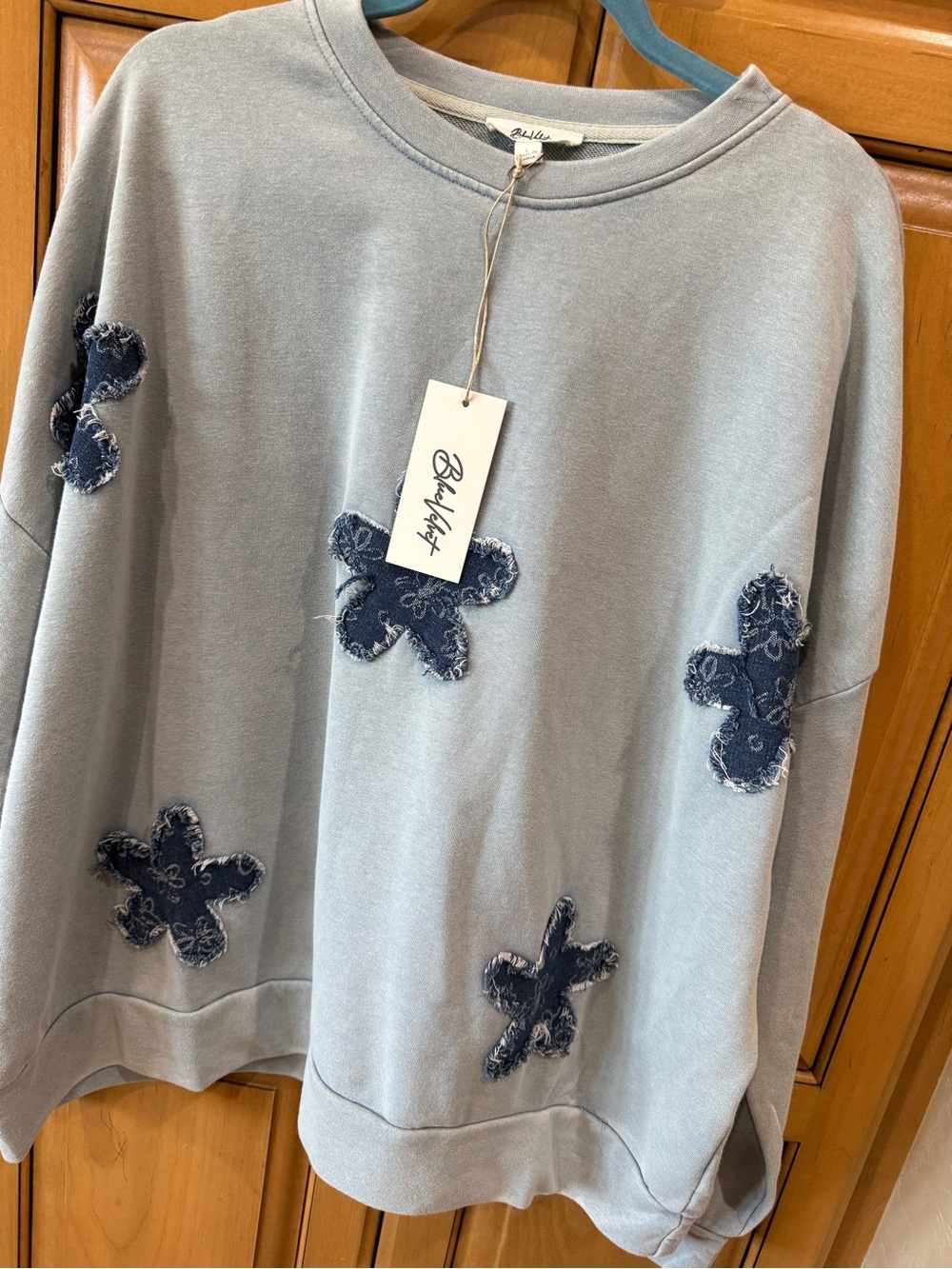 Blue Velvet Light Blue Sweatshirt with Dark Blue Floral Appliqués